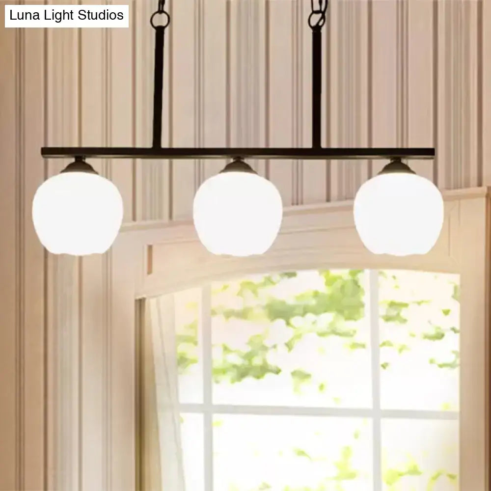 Industrial black 3-light opal glass globe pendant – dining room