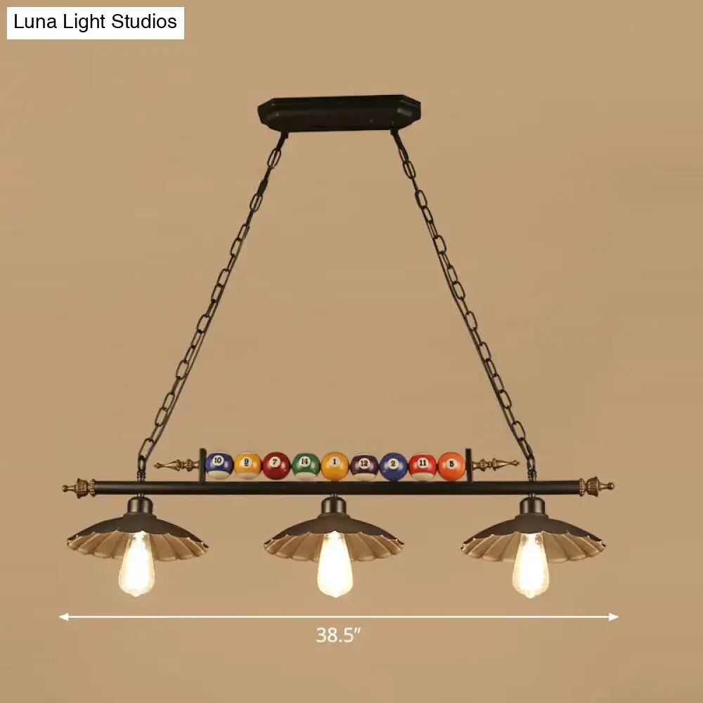 Industrial black and brass billiard ball light dining room fixture