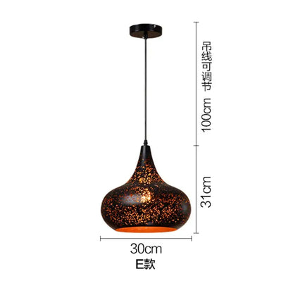 Industrial black and gold etched wrought iron chandelier dining room