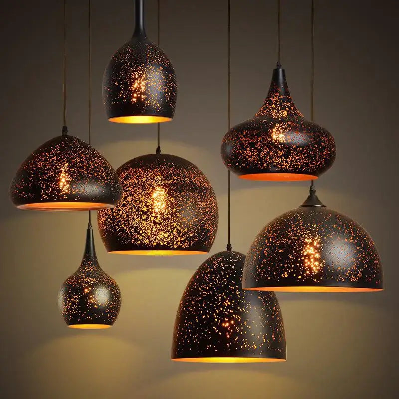 Industrial black and gold etched wrought iron chandelier dining room