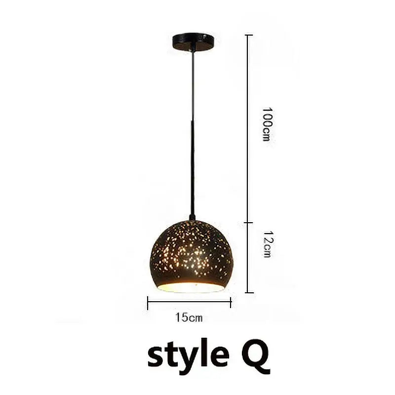 Industrial black and gold etched wrought iron chandelier dining room