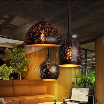 Industrial black and gold etched wrought iron chandelier dining room