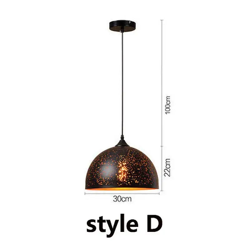 Industrial black and gold etched wrought iron chandelier dining room