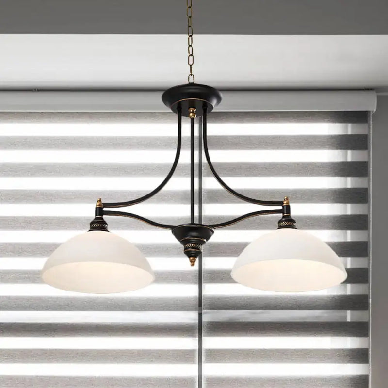 Industrial black & brass dome island light with opal glass dining room