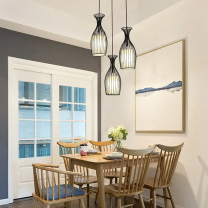 Industrial black iron cage pendant lights for dining room