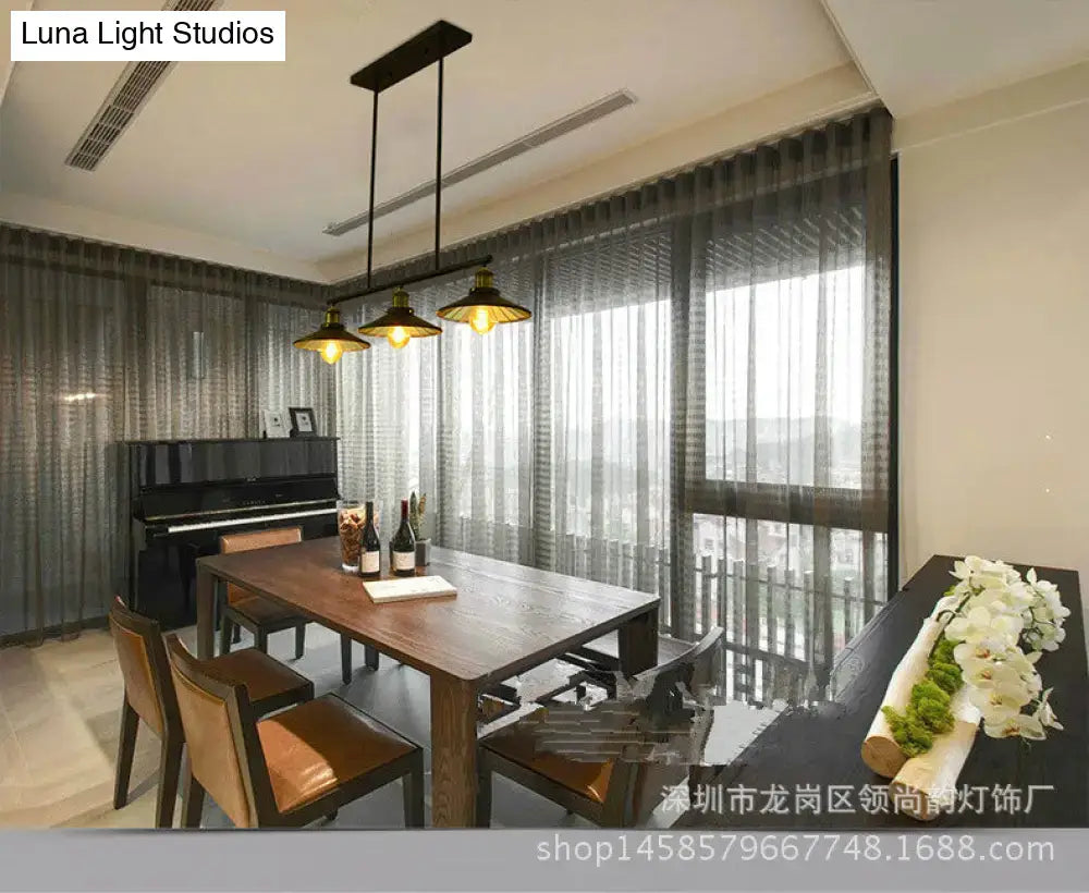 Industrial black metal island pendant with cone shade dining room light