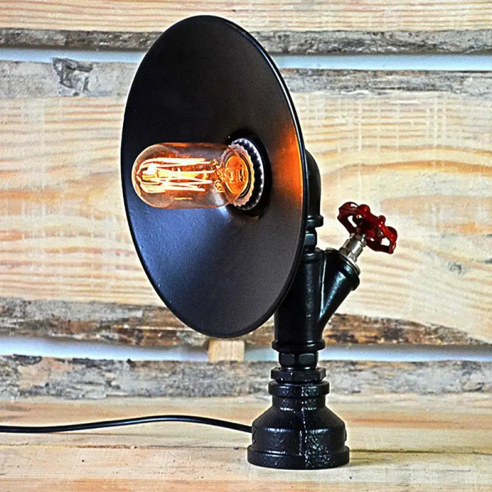 Industrial black metal table lamp with decorative red valve bedroom