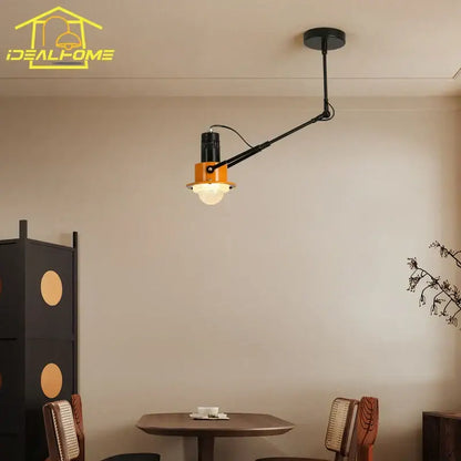 Industrial black & orange swing arm wall lamp bedroom light