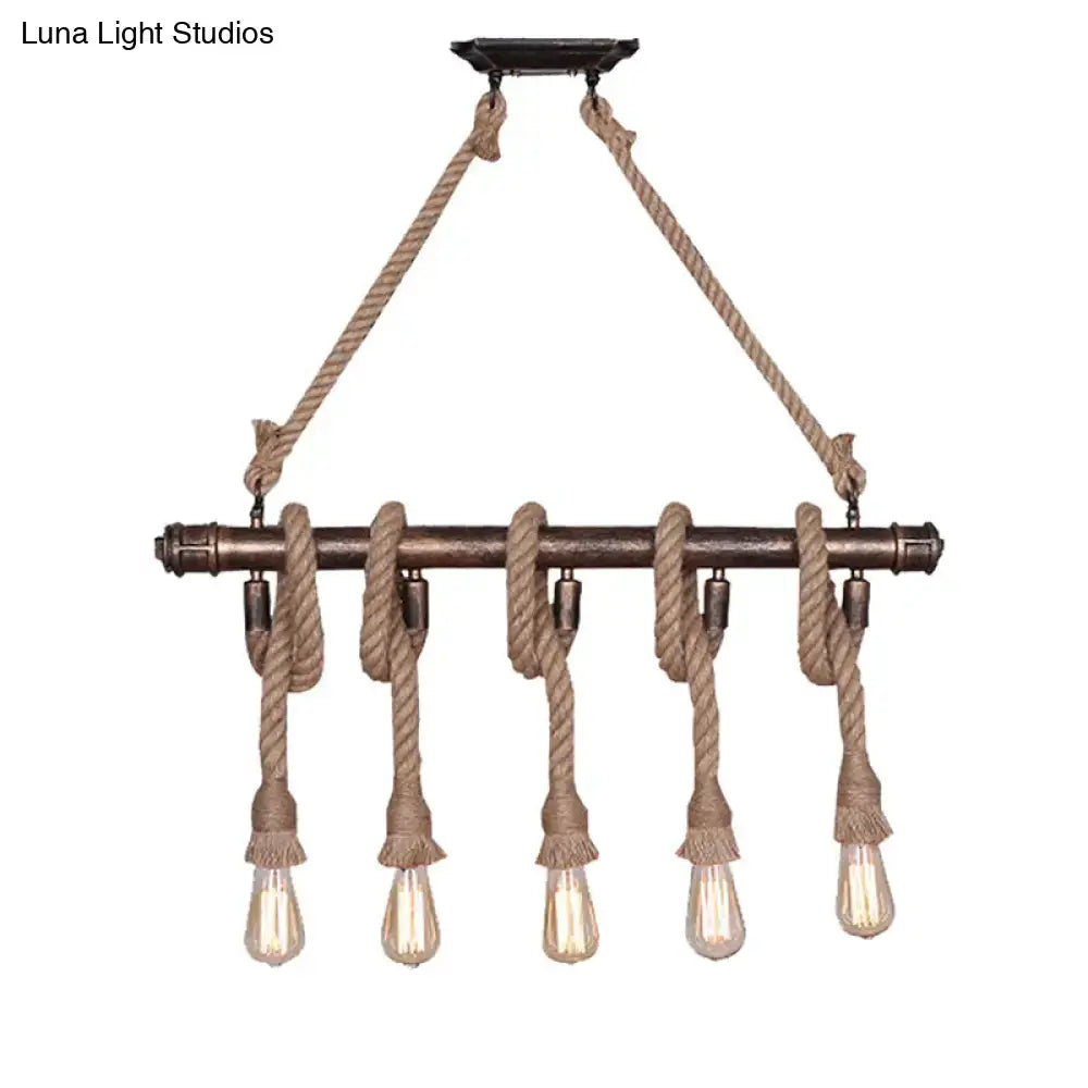 Industrial black pipe and rope chandelier for linear restaurant island