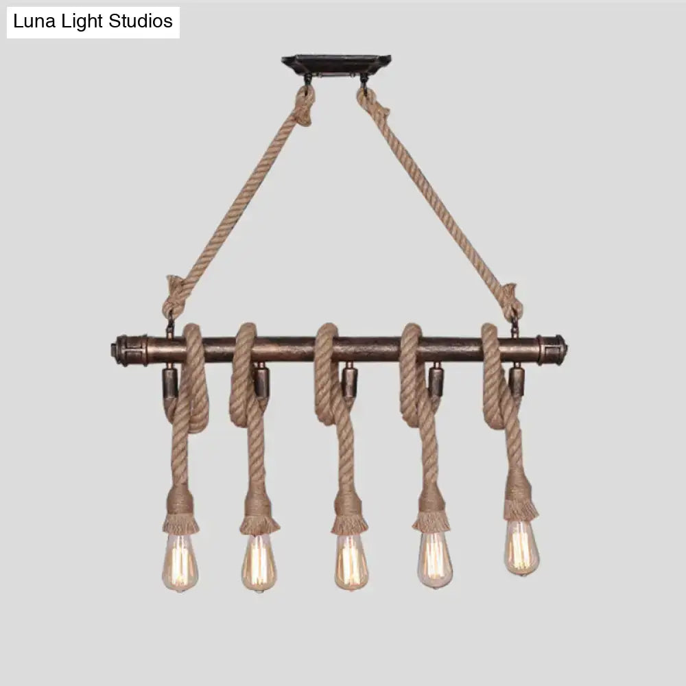 Industrial black pipe and rope chandelier for linear restaurant island