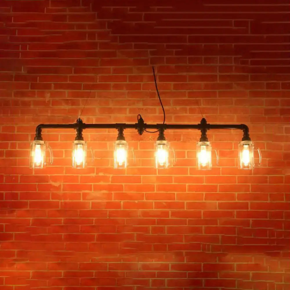 Industrial black pipe island light with beer mug glass shade dining room