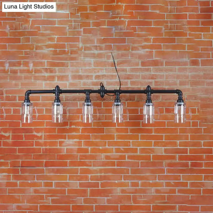 Industrial black pipe island light with beer mug glass shade dining room