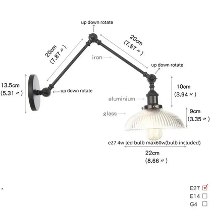 Industrial black swing arm wall light fixture with faceted glass shade