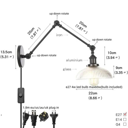 Industrial black swing arm wall light fixture with faceted glass shade