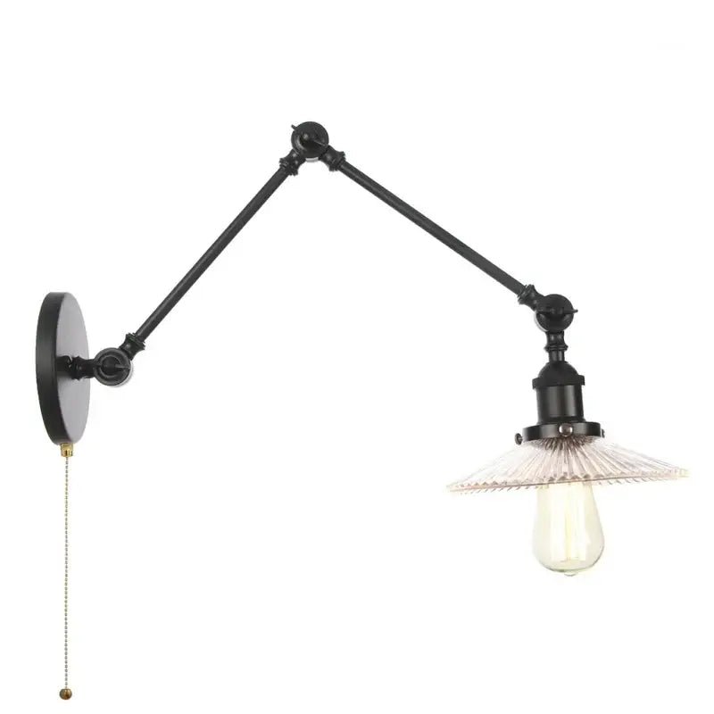 Industrial black swing arm wall light fixture with faceted glass shade