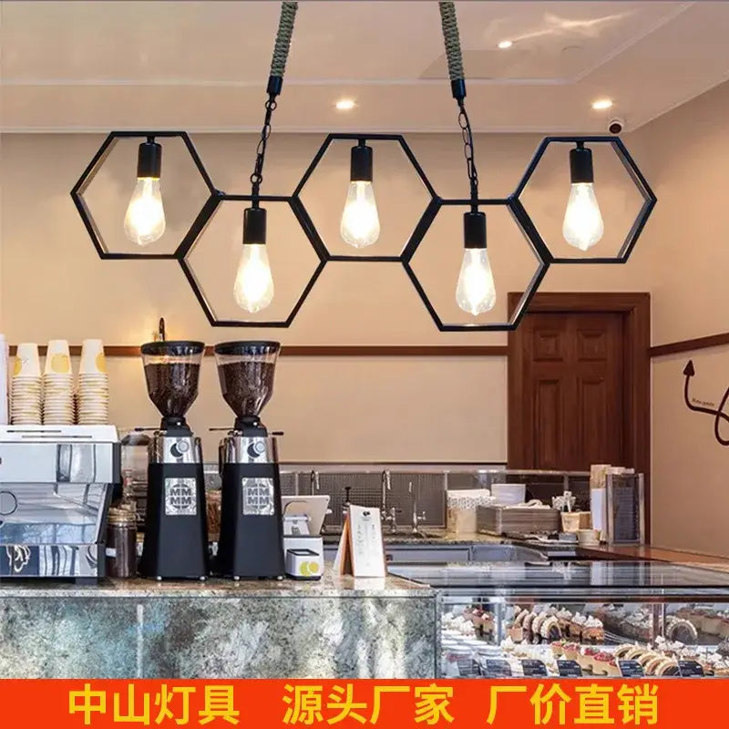 Industrial brass hexagonal pendant light – bar and restaurant dining