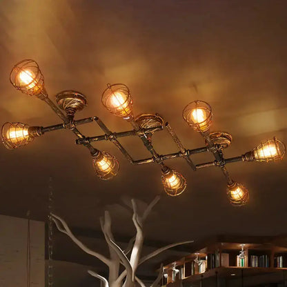 Industrial brass intersecting piping ceiling light dining room cage