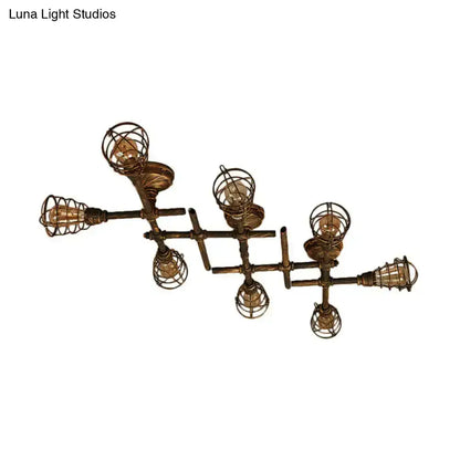 Industrial brass intersecting piping ceiling light dining room cage