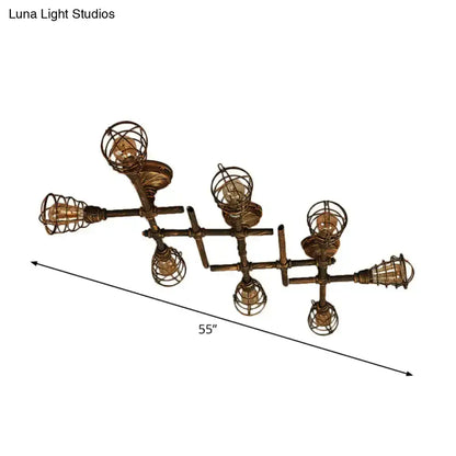 Industrial brass intersecting piping ceiling light dining room cage