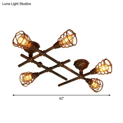 Industrial brass intersecting piping ceiling light dining room cage