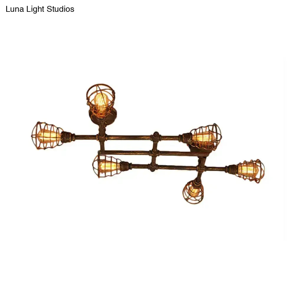 Industrial brass intersecting piping ceiling light dining room cage