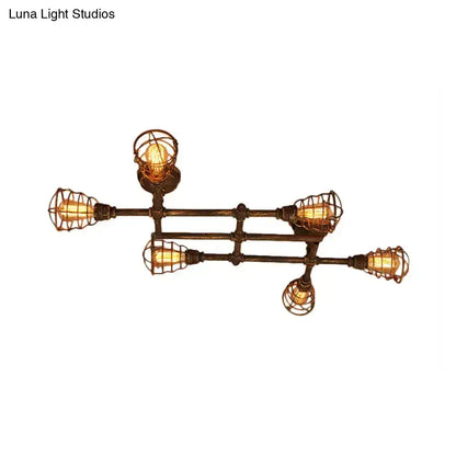 Industrial brass intersecting piping ceiling light dining room cage
