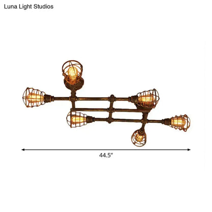 Industrial brass intersecting piping ceiling light dining room cage