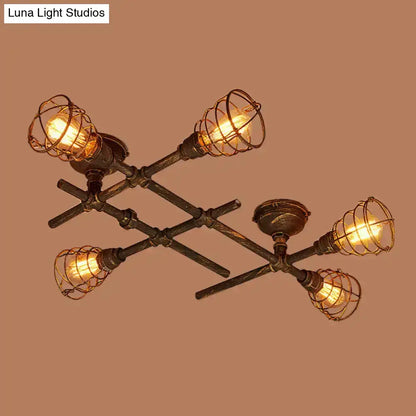Industrial brass intersecting piping ceiling light dining room cage