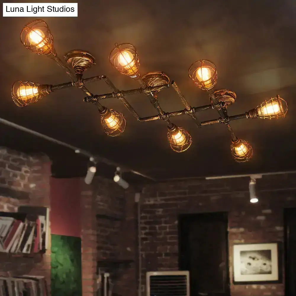 Industrial brass intersecting piping ceiling light dining room cage