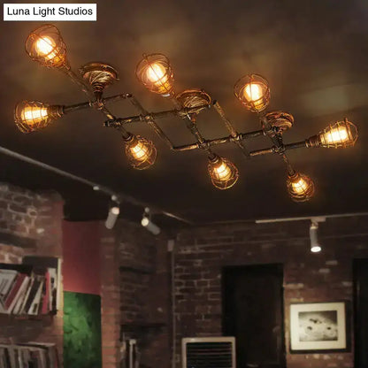 Industrial brass intersecting piping ceiling light dining room cage
