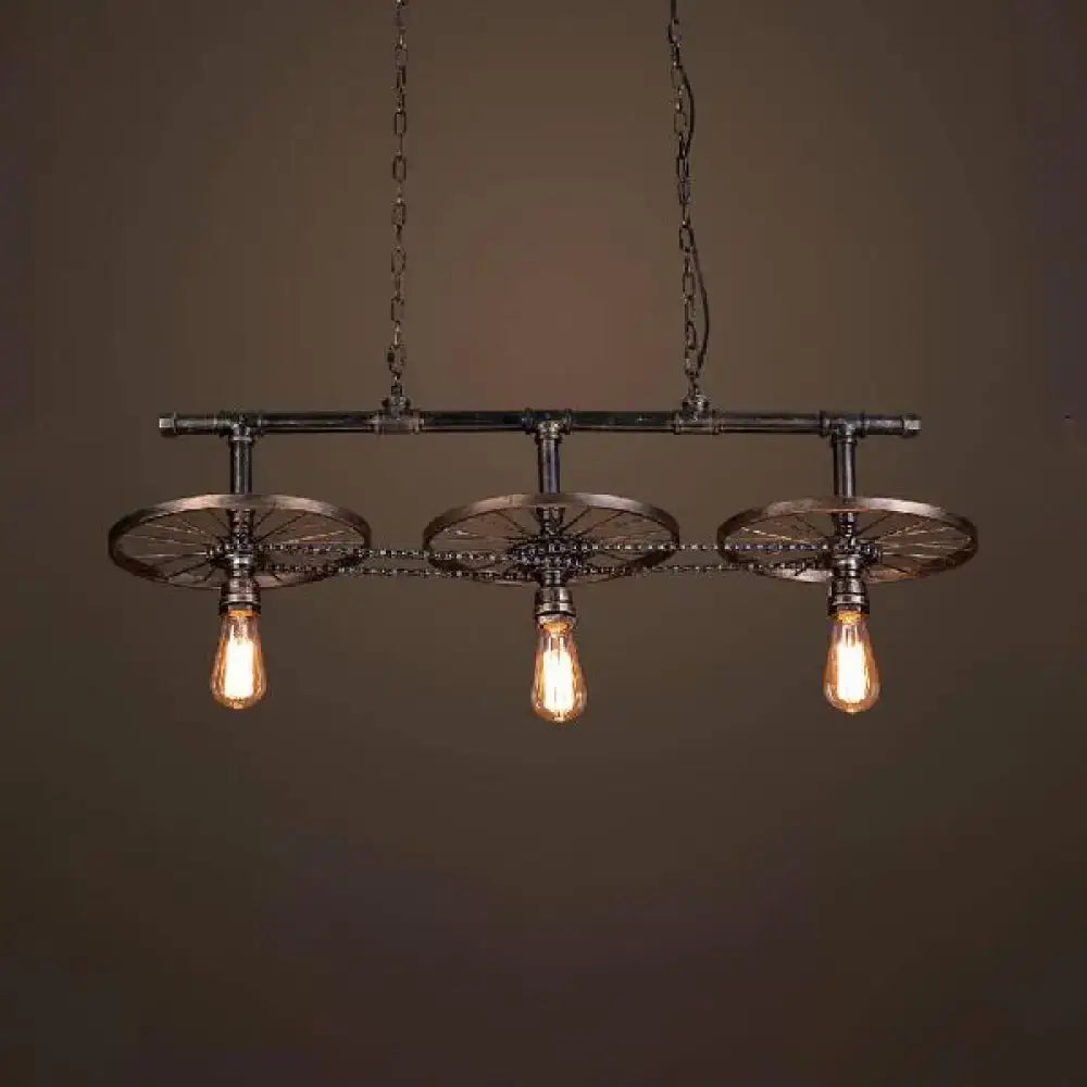 Industrial bronze wheel island pendant light with bare bulbs kitchen