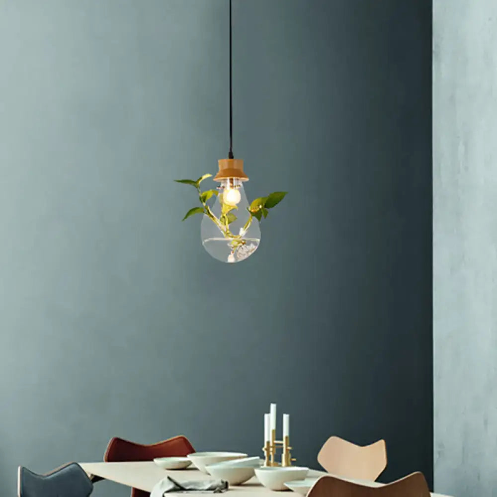 Industrial glass and wood pendant light kit with exposed bulb dining room