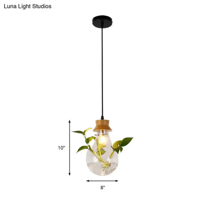 Industrial glass and wood pendant light kit with exposed bulb dining room