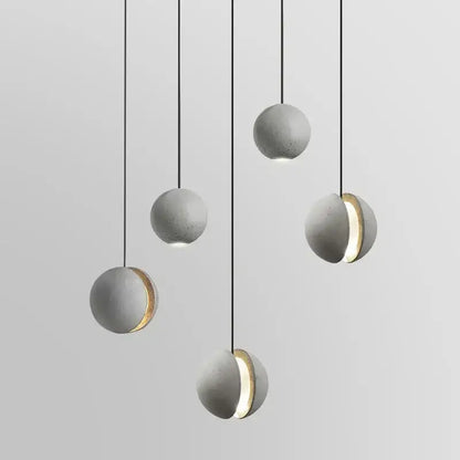 Industrial gray and gold cement pendant light dining room sphere