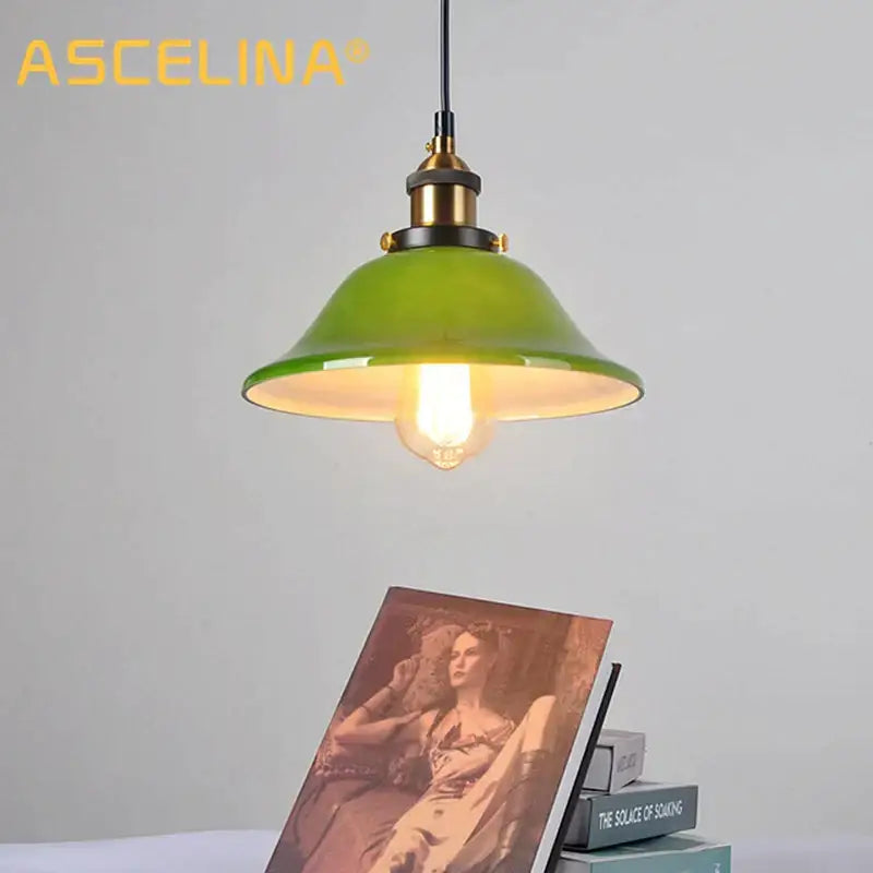 Industrial green glass pendant light dining room with brass accents