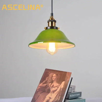 Industrial green glass pendant light dining room with brass accents
