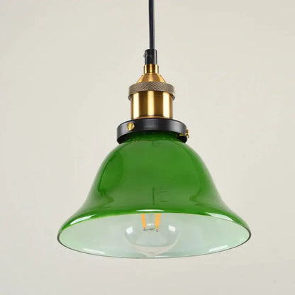 Industrial green glass pendant light dining room with brass accents