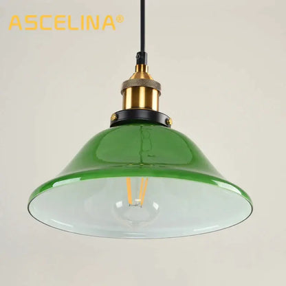 Industrial green glass pendant light dining room with brass accents