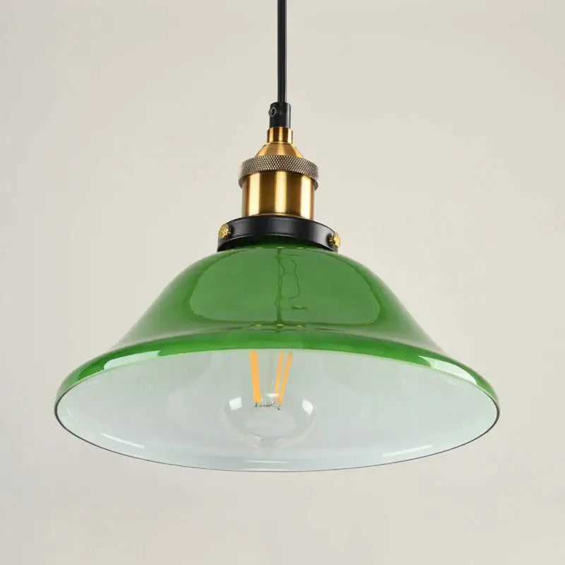 Industrial green glass pendant light dining room with brass accents