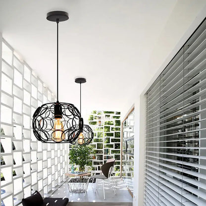 Industrial iron pendant lights black & white wireframe dining room