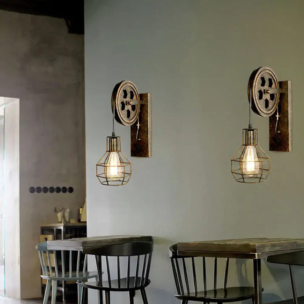 Industrial iron wall sconce with wooden pulley for cafe decor