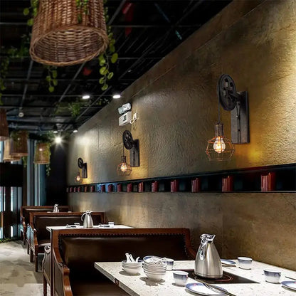 Industrial iron wall sconce with wooden pulley for cafe decor