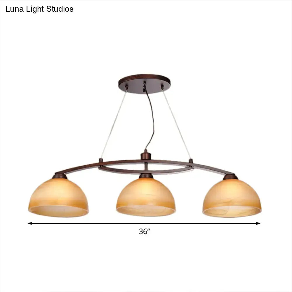 Industrial oil rubbed bronze 3-bulb amber glass island light kitchen