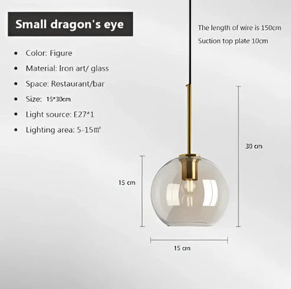 Industrial smoked glass and brass pendant light – dining room