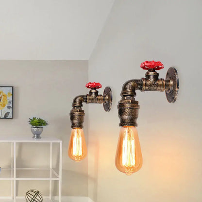 Industrial water pipe wall sconce kitchen light in black & brass