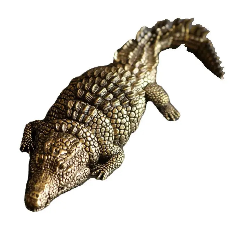 Intricate brass crocodile sculpture living room decor accessory