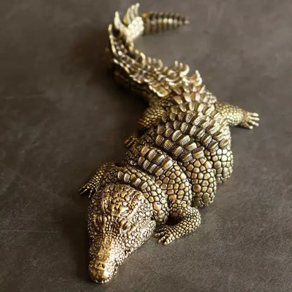 Intricate brass crocodile sculpture living room decor accessory