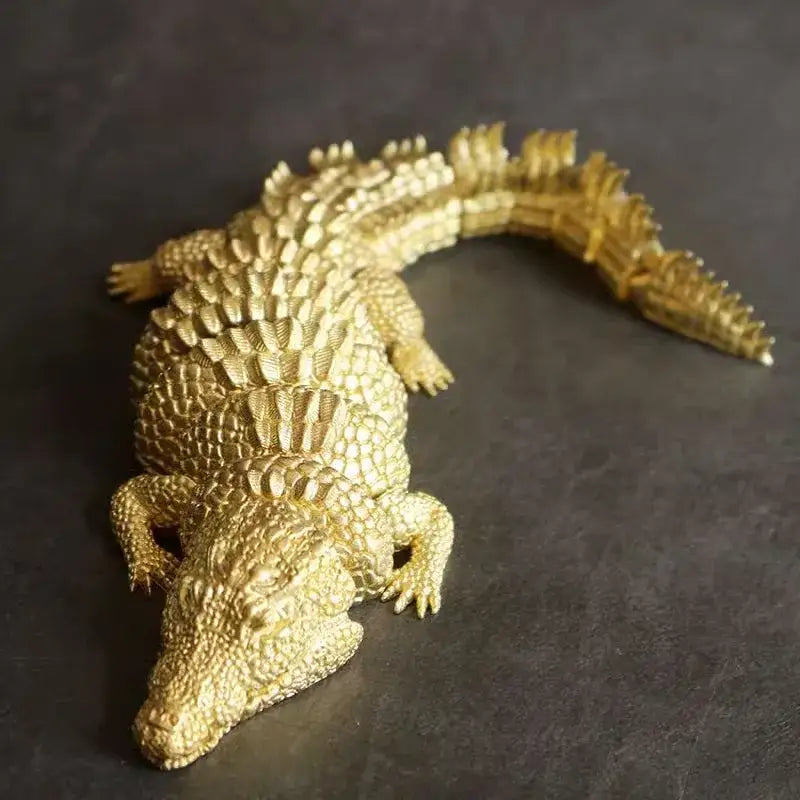 Intricate brass crocodile sculpture living room decor accessory