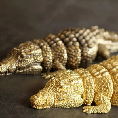 Intricate brass crocodile sculpture living room decor accessory