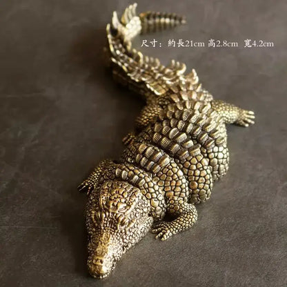 Intricate brass crocodile sculpture living room decor accessory